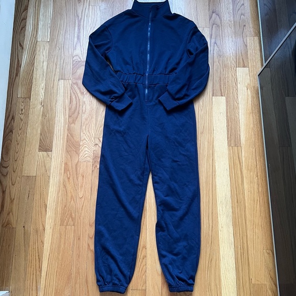 Navy blue zip up jogger jumpsuit. - Picture 1 of 4